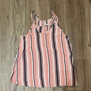 Small rip in top strap